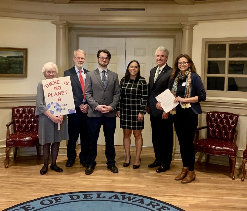 Advocates and state officials shown at the presentation are (l-r) Peggy Shultz, Delaware League of Women Voters Climate Change and Energy co-chair; John Irwin, Sierra Club Delaware Climate & Energy chair; Dustyn Thompson, Sierra Club Delaware Advocacy and Outreach organizer; Natalie Criscenzo, Legislative Affairs director for Gov. John Carney; DNREC Secretary Shawn Garvin; and Shweta Arya, Delaware Interfaith Power & Light executive director. SUBMITTED PHOTO