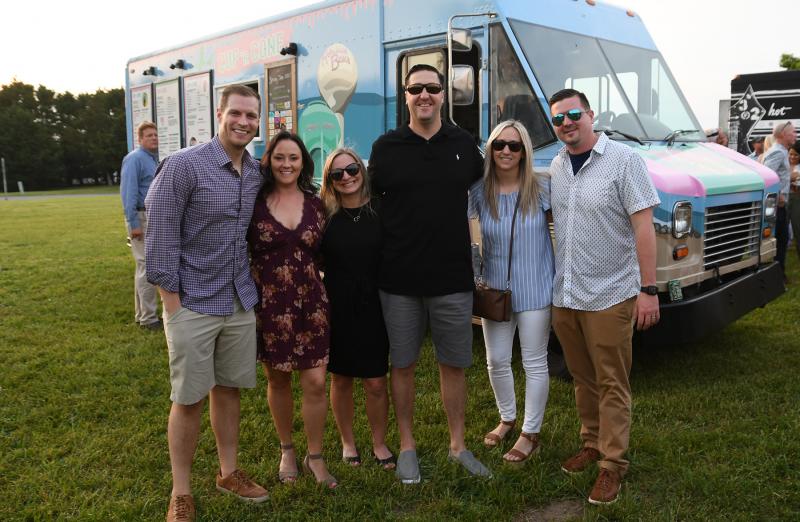 Smiling for the camera are (l-r) Jim McDowell, Cape High Principal Nikki Miller, Becky Coulter, Drew Coulter, and Ally and Kyle Bentley.