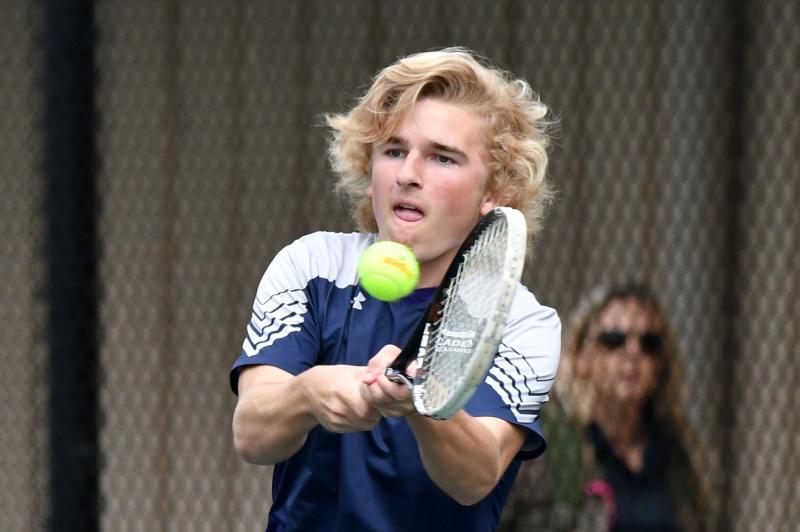 Sussex Academy senior Michael Daniello hits a backhand drive. He fell in the second round to Smyrna’s Phillip Hughes 2-6, 6-4, 6-4.