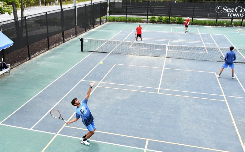 Rahul A. Patel and Rahul C. Patel play Polytech’s Nathan Jacobs and Thomas Crumrine in a second doubles match.