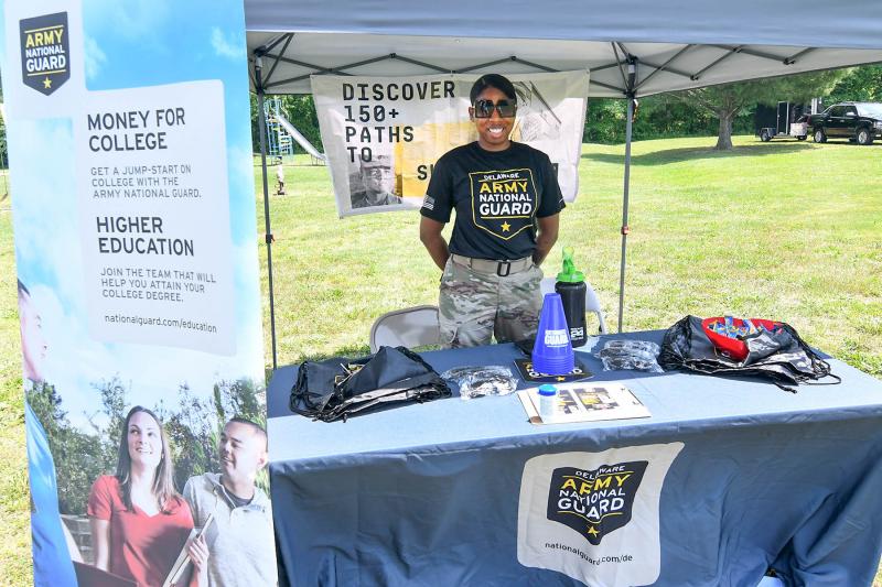 Woodbridge grad Sgt. Chateedra McGee gives out information at the Army National Guard table.
