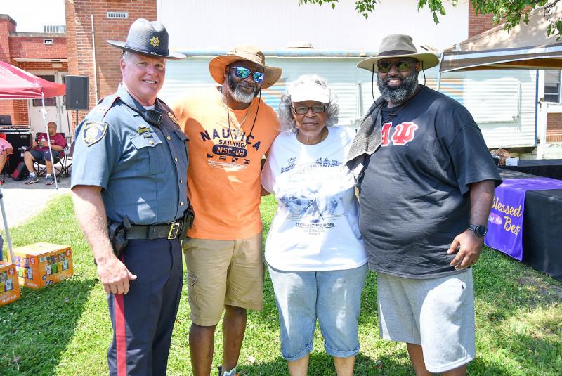 Speaking about the event are (l-r) Georgetown Police Chief Ralph Holm, event co-creator Lorenzo Hopkins, Jane Hovington and co-creator Cliffvon Howell.