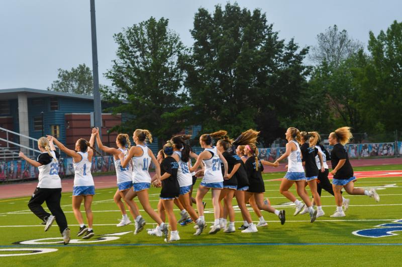 A tradition started by coach P.J. Kesmodel, the team skips to the home stands to say thanks and share the moment.