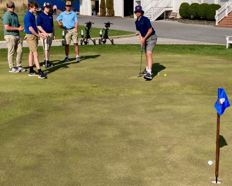 Dalen Daminger watches his putt track toward the hole in a recent competition among Cape golfers who were not playing in that day’s varsity match. Observing Daminger's putt are (l-r) Quinn Rae, Bret Miller, Shane Whittam and Will Ciabattoni. Daminger’s team earned a 12-pack of Reese’s Cups for their win. FRITZ SCHRANCK PHOTOS