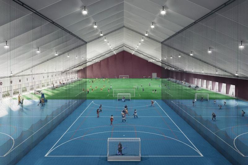 An interior rendition shows how the fieldhouse could be used with activities on the sports courts, foreground, and turf field going on simultaneously. SUSSEX SPORTS CENTER FOUNDATION GRAPHIC