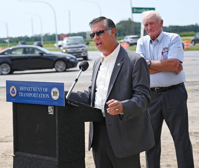 Rep. Steve Smyk, R-Milton, says he often responded to crashes at the Route 1/Route 16 intersection when he was a Delaware State Police trooper. Sen. Dave Wilson, R-Bridgeville, listens in the background.