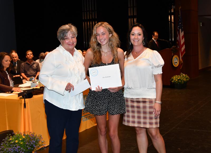 Elle Anderson received the David and Linda Robinson Scholarship, the Gerry and Sandy Reynolds Memorial Scholarship, the Johnson Orthodontics Extraordinary Smiles Scholarship, the President's Award for Educational Excellence and the University of Delaware Trustee Scholarship. Shown are (l-r) Linda Robinson, Anderson and Cape Principal Nikki Miller.