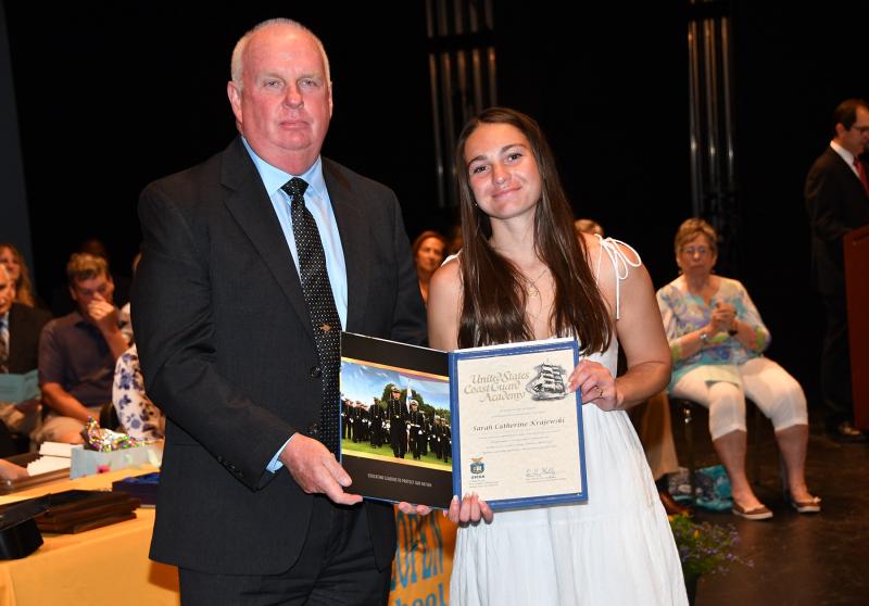 Sarah Krawjewski received the U.S. Coast Guard Academy Scholarship for $300,000. Shown are (l-r) Bib Finley of the U.S. Coast Guard Academy and Krajewski.