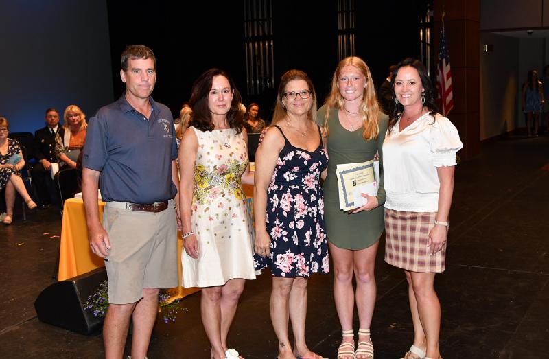 Elizabeth Melson received the Katelyn Irwin Memorial Scholarship and the Maggie Browne Memorial Scholarship. Shown are (l-r) coach Tim Bamforth, Monica Browne, Jody Breen, Melson and Cape Principal Nikki Miller.