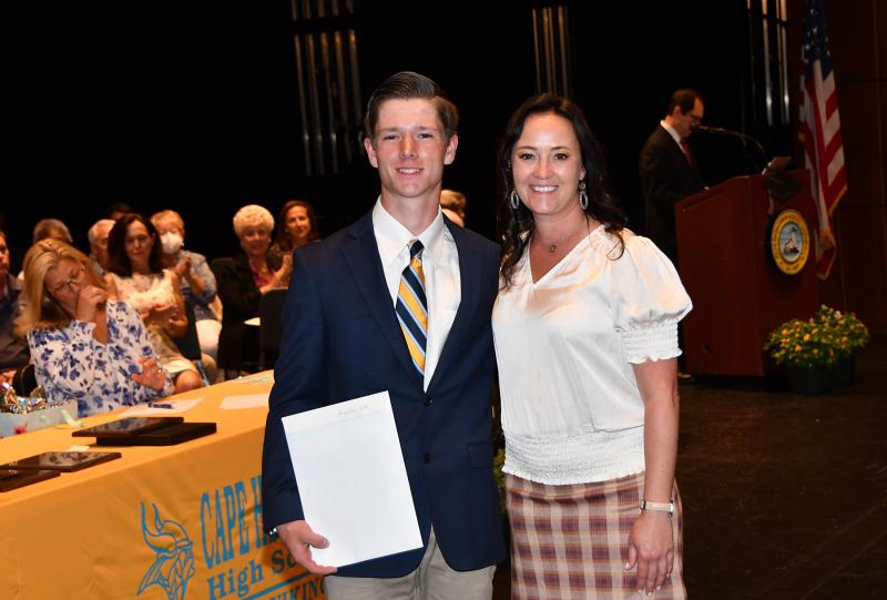 Seth Reynolds received the Avenue United Methodist Church Scholarship, J.D. O'Connor Scholarship Fund, John M. Roca Memorial Scholarship, NC State Scholarship and the President's Award for Educational Excellence. He is shown with Cape Principal Nikki Miller.