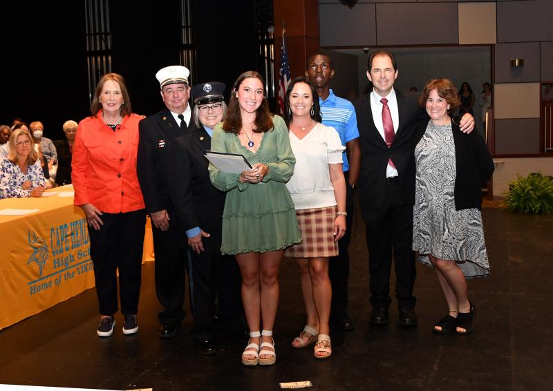 Emily Simon received a scholarship from the Col. David Hall Chapter of the Daughters of the American Revolution, the Greenbaum Scholarship, Herman Oscar Brittingham Educational Scholarship, McDonald's of Rehoboth Scholarship, President's Award for Educational Excellence, Principal's Award for Service, T. A. Shipley Scholarship - Lewes Fire Department and the Thespians Outstanding Senior Award. Shown are (l-r) Debbie Russo, Charlie and Erika Arnold, Simon, Principal Nikki Miller, Ronnie Anglin and Joel and Alyssa Simon.