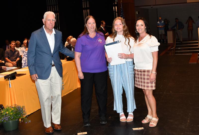 Chloe Sylvester received the Cape Henlopen Elks Lodge 2540 Scholarship, the Darby Mowll RN Nursing Scholarship and the Village Improvement Association Good Citizenship Award. Shown are (l-r) Charles Mowll, Joanne Maier, Sylvester and Cape Principal Nikki Miller.