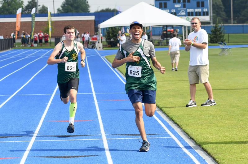 Newark Dragons athlete Joshua Davis sprints to the finish to win the gold medal in the 400-meter run.