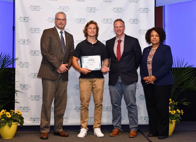 Matt Kracyla of Middletown received the Highest Team GPA Award. Shown are (l-r) Del Tech Dean of Instruction John Buckley, Kracyla, head coach Sean Tischler, and Del Tech Vice President and Terry Campus Director Cornelia Johnson.