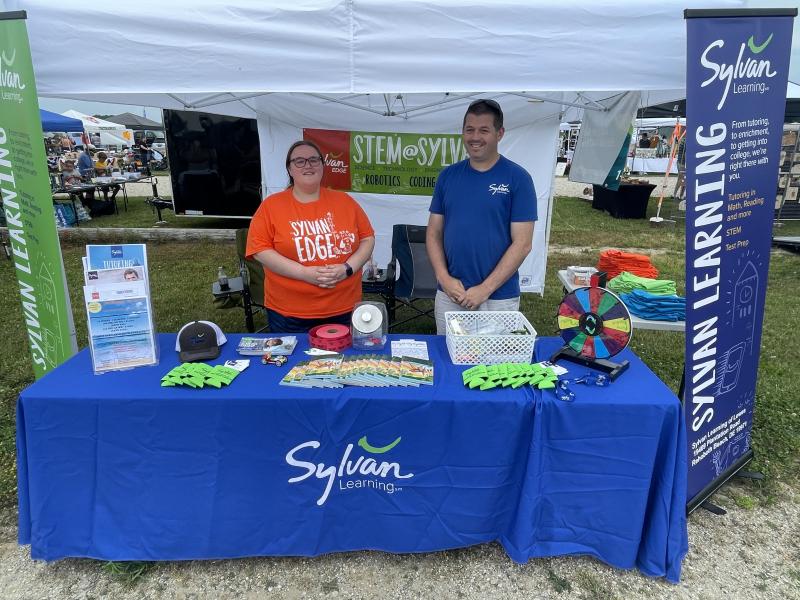 Sylvan Learning offers educational opportunities for local kids. Shown are Elizabeth Marshall, left, and Jason Blanshine, center director.