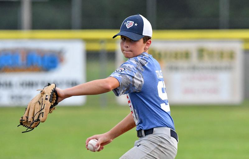 Lewes pitcher Ben Tollett delivers to the plate.