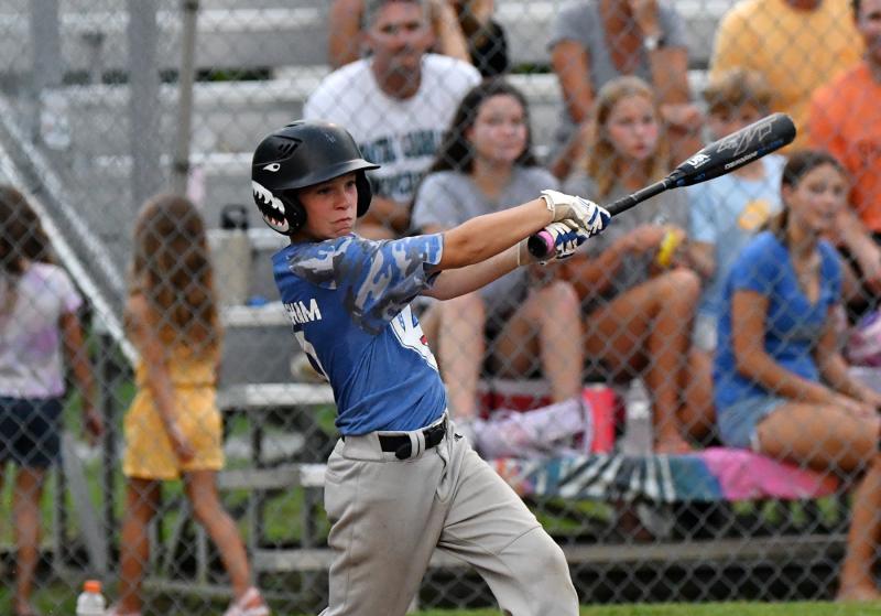 Anthony Brittingham slams the ball into the outfield.