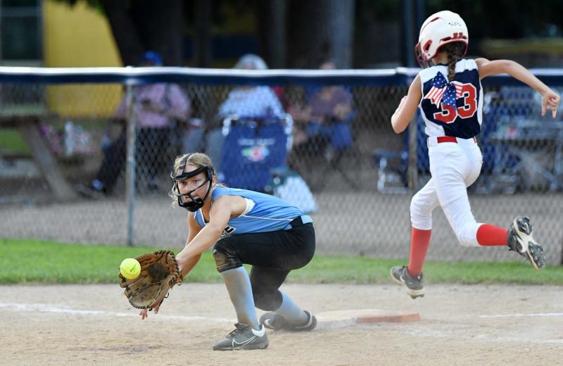 Cape first baseman Taylor Huff gets the throw at first, but MOT’s Brynleigh Bennett was called safe on the close play.