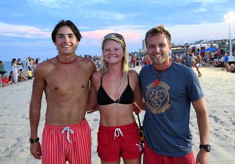 Assisting with the beach flags competition are RBP guards (l-r) Rawley Florax, Meredith Lockwood and Hunter Mcfalls.