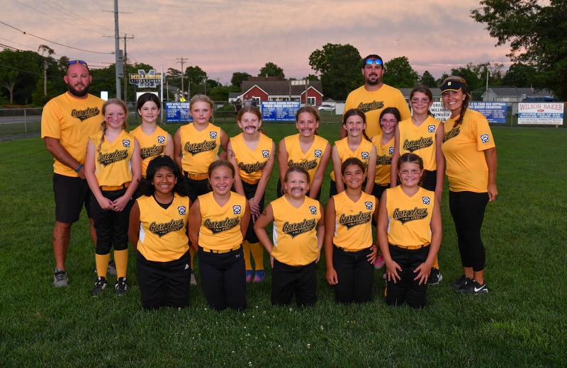 The Georgetown team members are in back (l-r) coach Justin Illian, Kayleigh Conaway, Aspen Schaffer, Ashlyn Troxler, Jade Womer, Olivia Ballback, Brooke Holston, coach Matt Millman, Tori Millman, Emily Stephens and manager Lindsay Cannon. In front are Sara “Rosie” Baker, Aubrey Jones, Georgia Murray, Rocsi Cannon and Scarlett Illian.