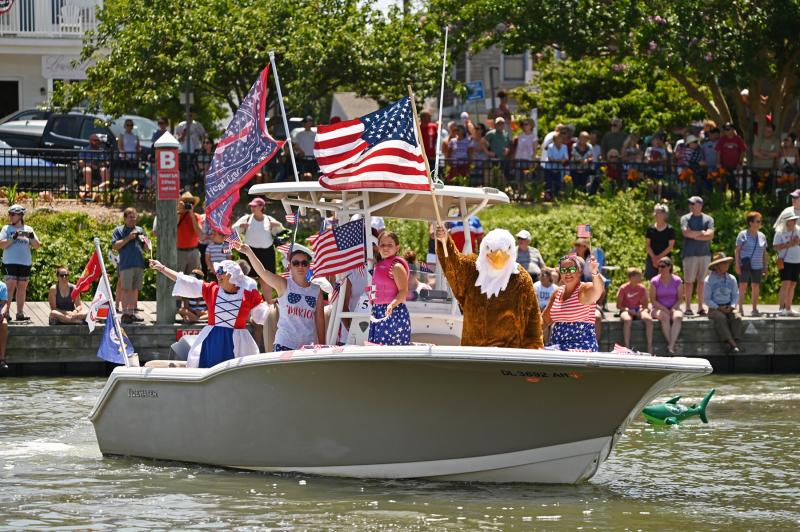 Riding the Red, White & Booze of Capt. Eric Beck are Sarah, Anna, Max and Elle Beck; Russ and Debbie Wolf; and Amy and Maverick Strong.
