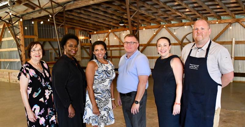 This year, proceeds of the festival will go to Children’s Beach House and Pathways to Success. In the photo are (l-r) Sarah Gilmour, outreach coordinator, and Faye Blake, executive director, Pathways to Success; Stacy LaMotta, founder of the event; and Rich Garrett, CBH executive director, Meg Gardner, director of resource development and catering operations, and Dom Pandolfino, executive chef.
