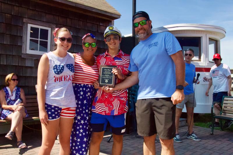 The Beck family’s Red, White & Booze boat captured first place. Shown are (l-r) Anna Beck, Max Beck, Sarah Beck and Eric Beck. AARON MUSHRUSH PHOTO
