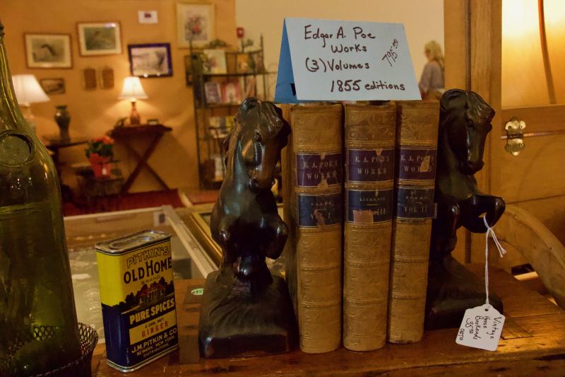 A trio of Edgar Allen Poe books containing the works of the infamous writer published just six years after his death.