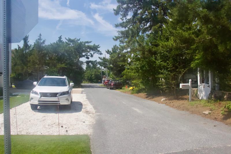 13 Kentucky Ave., which was recently built, has a two-car driveway made of shells running parallel with the home and street, forming an L with the traditional driveway.