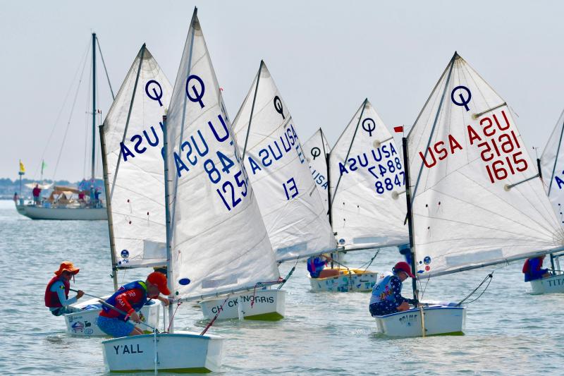 A large group of Optimist sailors start one of the races in the youth regatta. More than 50 young sailors competed in the Optimist races.