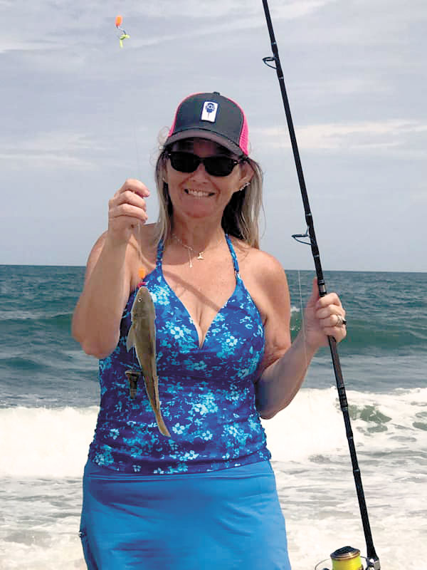 Jennifer Thornton caught a nice bluefish on a DS Custom Tackle mullet rig at Fenwick Island State Park drive-on.