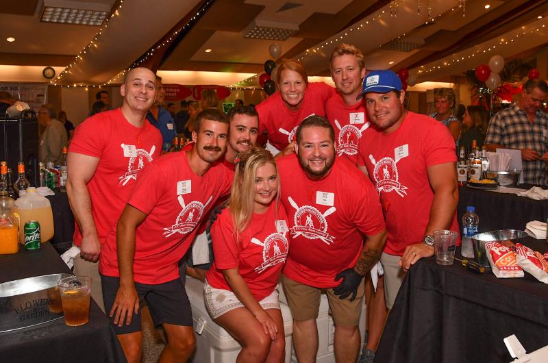 Volunteer bartenders for the event were (l-r) Zach Berl, Hank Coveleski, Nick Rosado, Holly Hutton, Carrie Lingo, Tate Clark, Conway Bristow and Murray Padgett.
