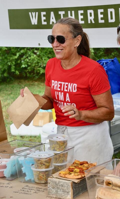 Kay Carney, of Weathered Eye Farm in Lewes, gets into the spirt of the Tomato Festival with her unique shirt.