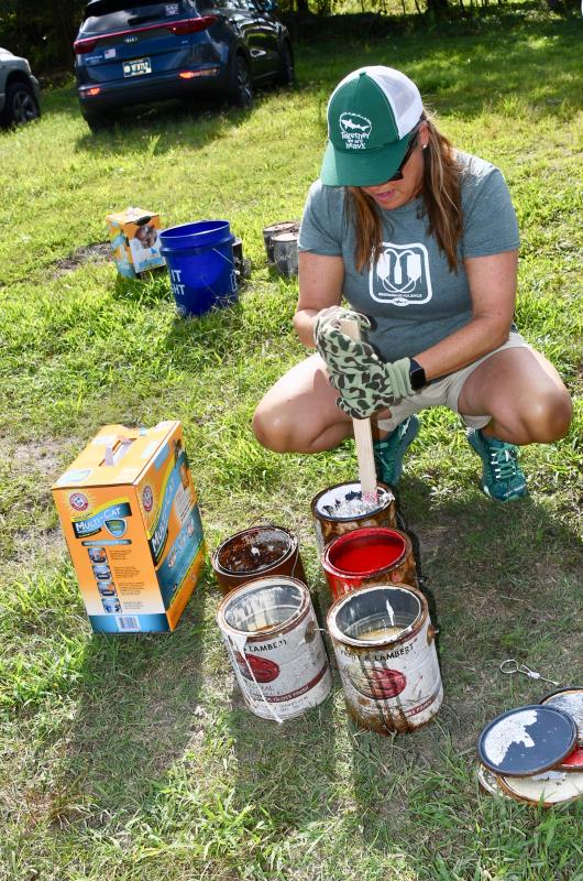 Mariah Calagione, co-founder of Dogfish Head Brewery along with her husband Sam, probably never dreamed she’d be mixing paint and kitty litter.
