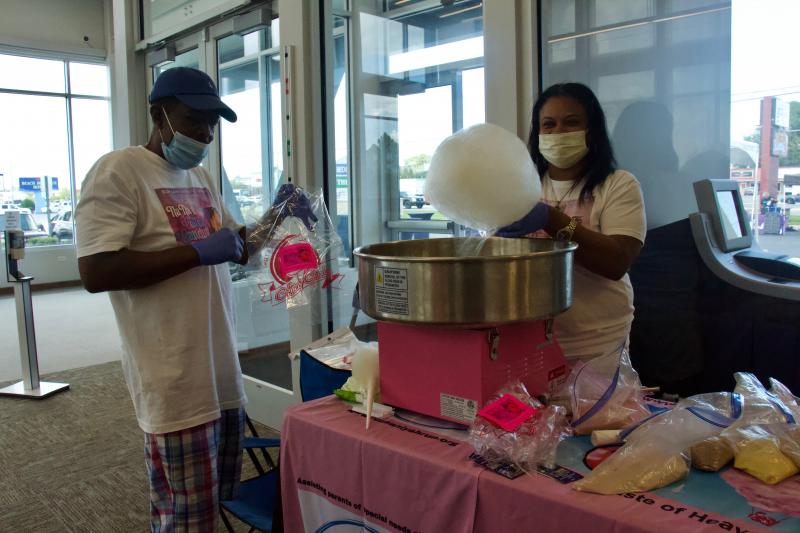 Tone and Gia Holden-Ruffin swirled up exotic flavors of cotton candy such as cappuccino and non-alcoholic sangria for Community Bank customers. The couple also started www.runsaniyarun.org in honor of their late daughter.