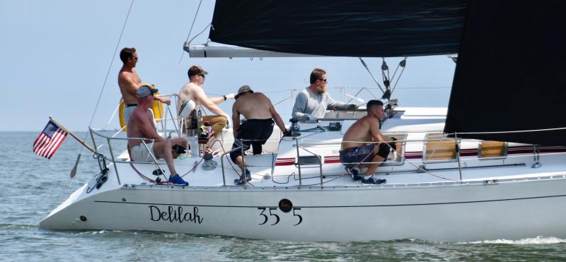 The crew of LYC boat Delilah, with Heath Gehrke at the helm, races to a second-place finish in the performance cruiser division.