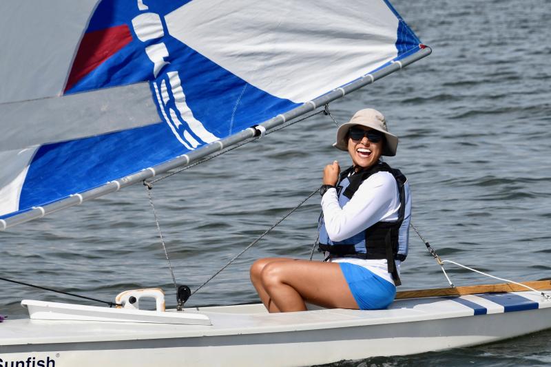 Lewes sailor Achareeya Gaston is all smiles as she prepares for one of the six races in the Sunfish regatta.