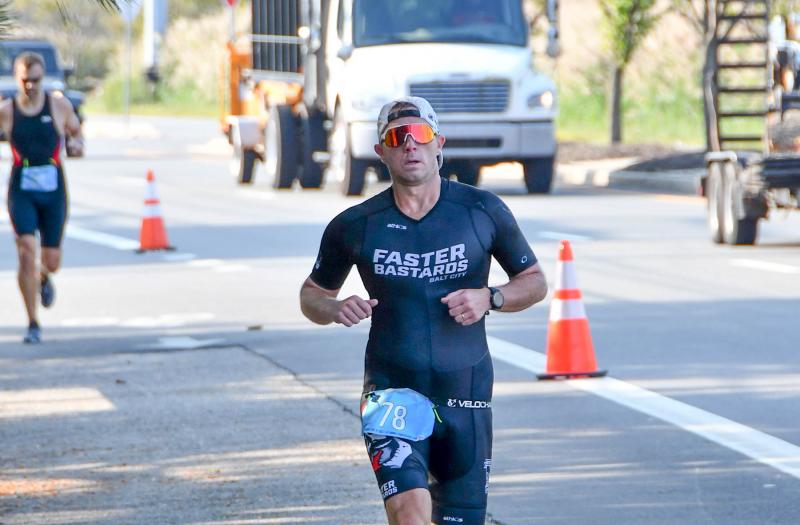 Christopher Brown from Baltimore runs the Dewey Beach course. He placed sixth overall and first in the male 35-39 age group.