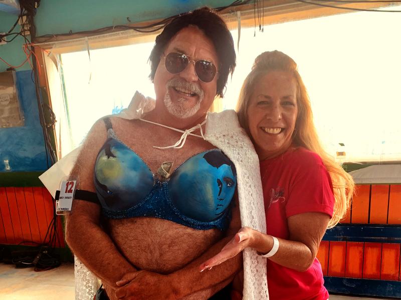 Delaware Breast Cancer Coaltion Operations Manager Sue Murray, right, poses with Bras for a Cause model Brad Yingst. SUBMITTED PHOTO