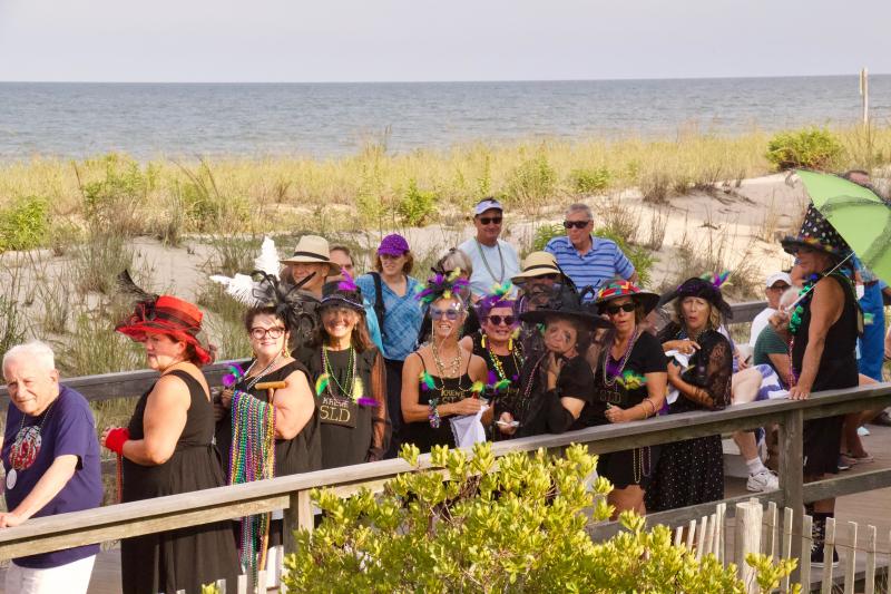 Attendees to the funeral, dressed in black, couldn’t hold back their emotions when the casket made its initial turn. The tears streamed and the makeup ran.