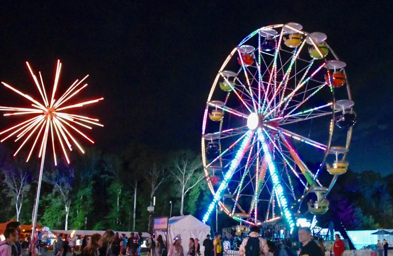 The Firefly grounds comes to life after sunset with lights, including those on a Ferris wheel. RON MACARTHUR PHOTO