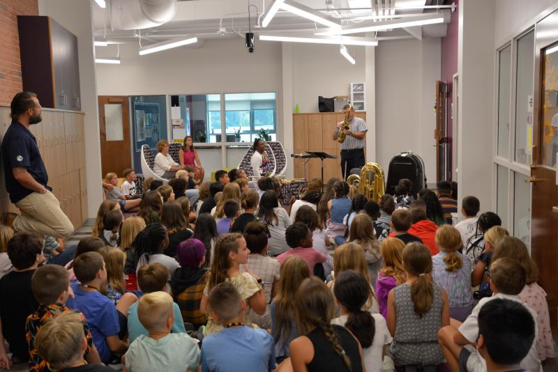 Fifth-grade students at Milton Elementary explore the various types of instruments they can learn to play with teacher Nick Greeson. SUBMITTED PHOTO