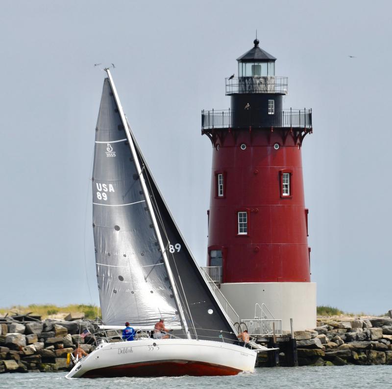 Delilah, which later ran aground and withdrew from the race, prepares to round the Delaware Breakwater.