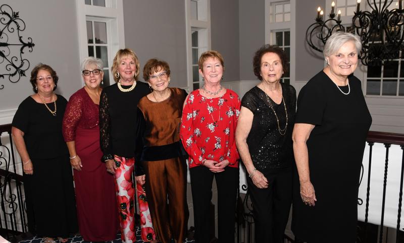 The gala committee includes (l-r) Pam Glick, Maggie Bauer, Barbara Rew, Carolyn Marshall, Nancy Beck, Terry Yates and Sue Crawford.  Missing from the photo is Judy Battista.