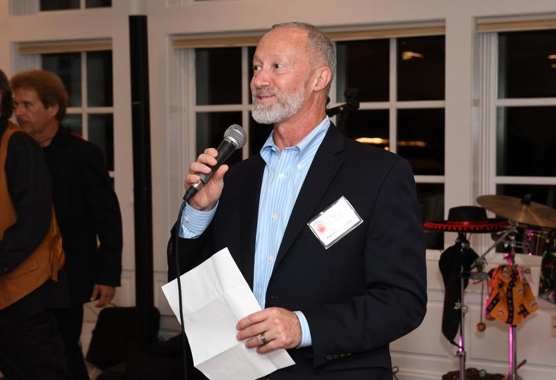 Overfalls Foundation President Mike Safina offers comments and recognition after the buffet.