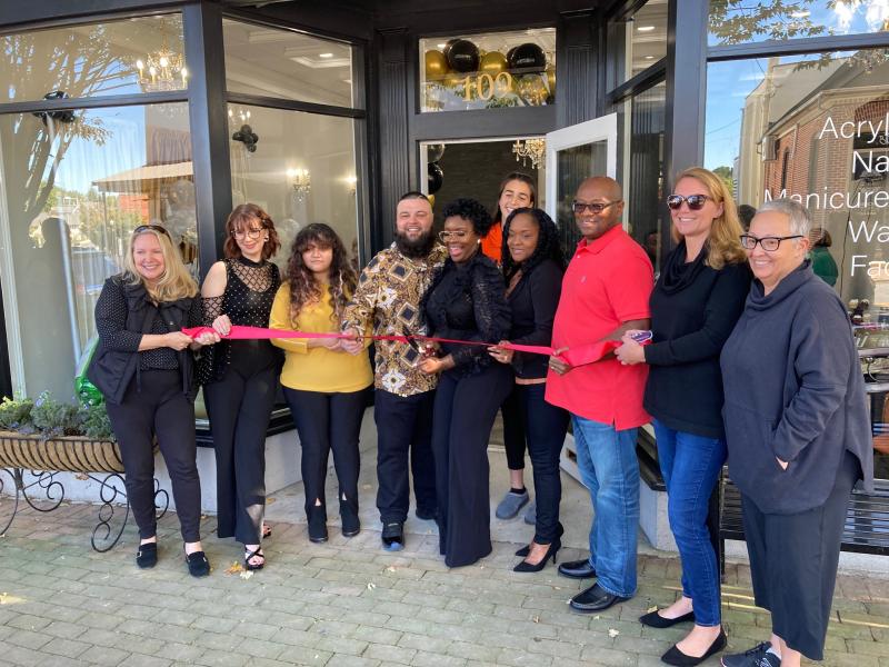 Taking part in the ribbon-cutting ceremony are (l-r) Milton Chamber of Commerce Executive Director Karen Falk, Thaliya Richardson, Citlalic Garcia-Martinez, Tony Carneiro, Kabreah Carneiro, Crystal Carneiro, Rhondalin Tingle, Darrell Tingle, Milton Chamber President Anne Brown and Gloria Garcia. RYAN MAVITY PHOTO