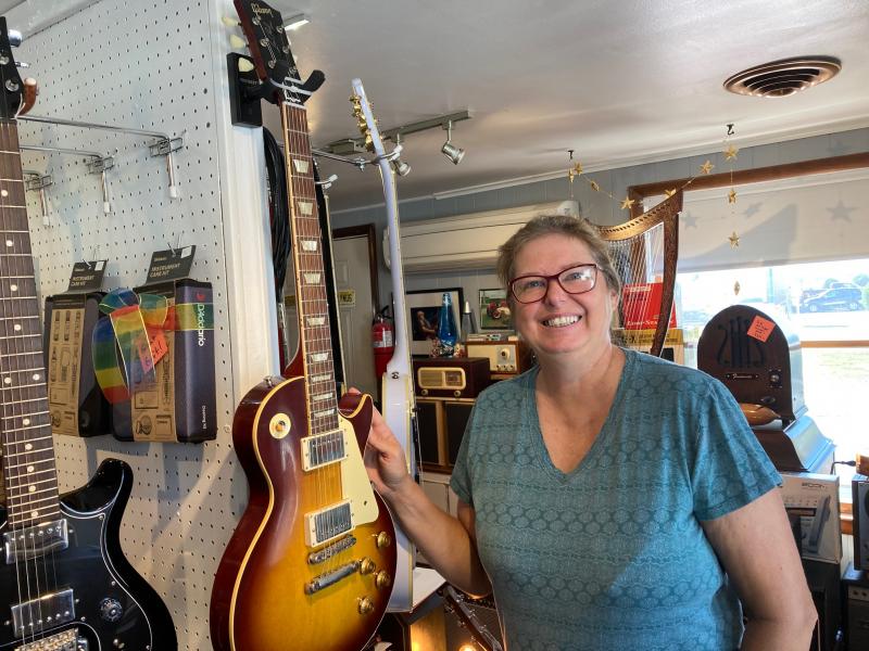 Mary Knight aka Mary Frantic started a nonprofit organization called Music Happens Project, which aims to provide subsidies for working musicians in the Cape Region. One of the organization’s early fundraising efforts is a raffle for this custom Gibson guitar, estimated value at $7,500. A drawing will be held Wednesday, Dec. 7. RYAN MAVITY PHOTO