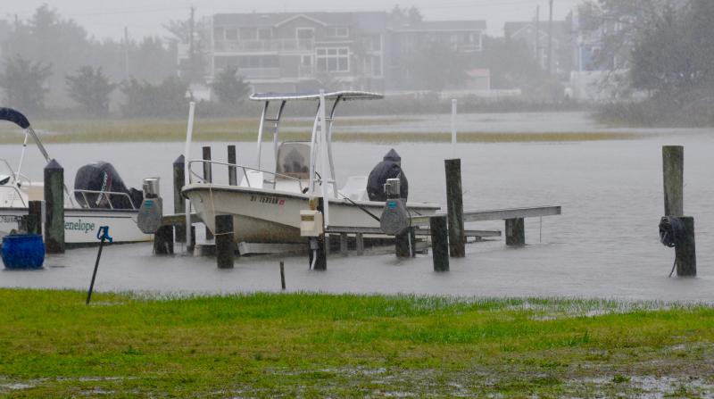 Docks along Pilottown Road in Lewes are covered by a rising Lewes-Rehoboth Canal. RON MACARTHUR PHOTO