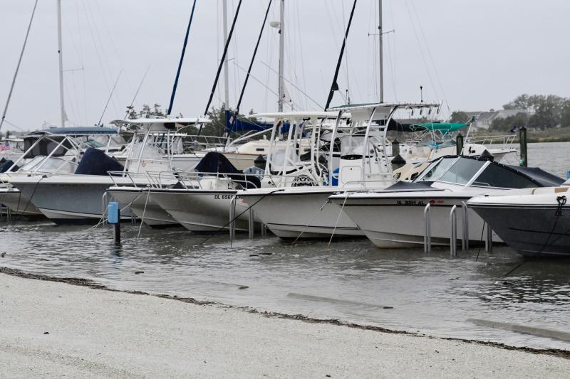 The docks and walkways in the this Pilottown Road marina in Lewes disappear under the rising waters of the Lewes-Rehoboth Canal. RON MACARTHUR PHOTO