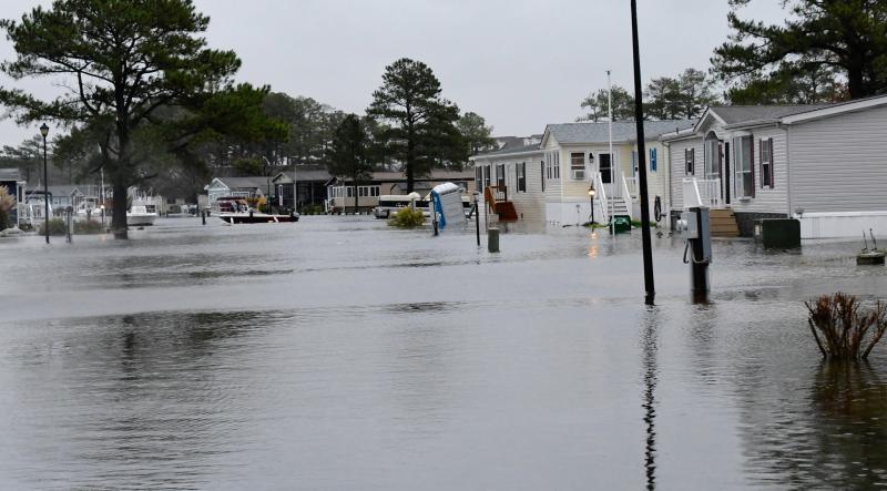 Mariner’s Cove near Long Neck is hard hit by rising waters from Rehoboth Bay during Monday’s high tide. RON MACARTHUR PHOTO